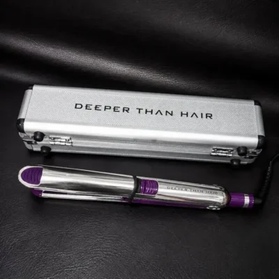 Deeper than hair straightener - purple and silver color - top angle photo