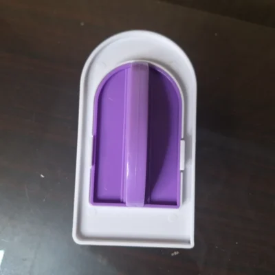 Fondant smoother tool with removable purple pads