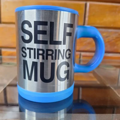 Self stirring mug button and handle design Self stirring mug button and handle design