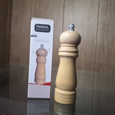 Solid wood manual pepper grinder