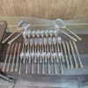 AVD 36 piece gold trimmed cutlery set full set laid out