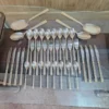 Overhead view of full AVD 36 piece cutlery set with serving pieces