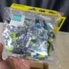 Hand holding Architect Bricks Toys 3128 parts bag