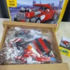 Decool 31010 - Box with Related Sets Decool 31010 box open showing parts bag and related 31011 set