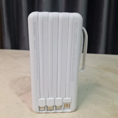 Prior P31 power bank spec label showing capacity and output ratings with built-in cables