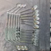 Alomi 32 piece cutlery set full set laid out on table