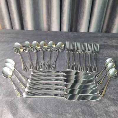 Angled view of full Alomi cutlery set arrangement