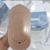 Uakeen ZL-227 folding travel iron soleplate steam vent pattern