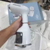 Uakeen ZL-220 garment steamer steam head close-up