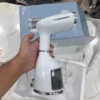 Uakeen ZL-220 garment steamer handle and power controls