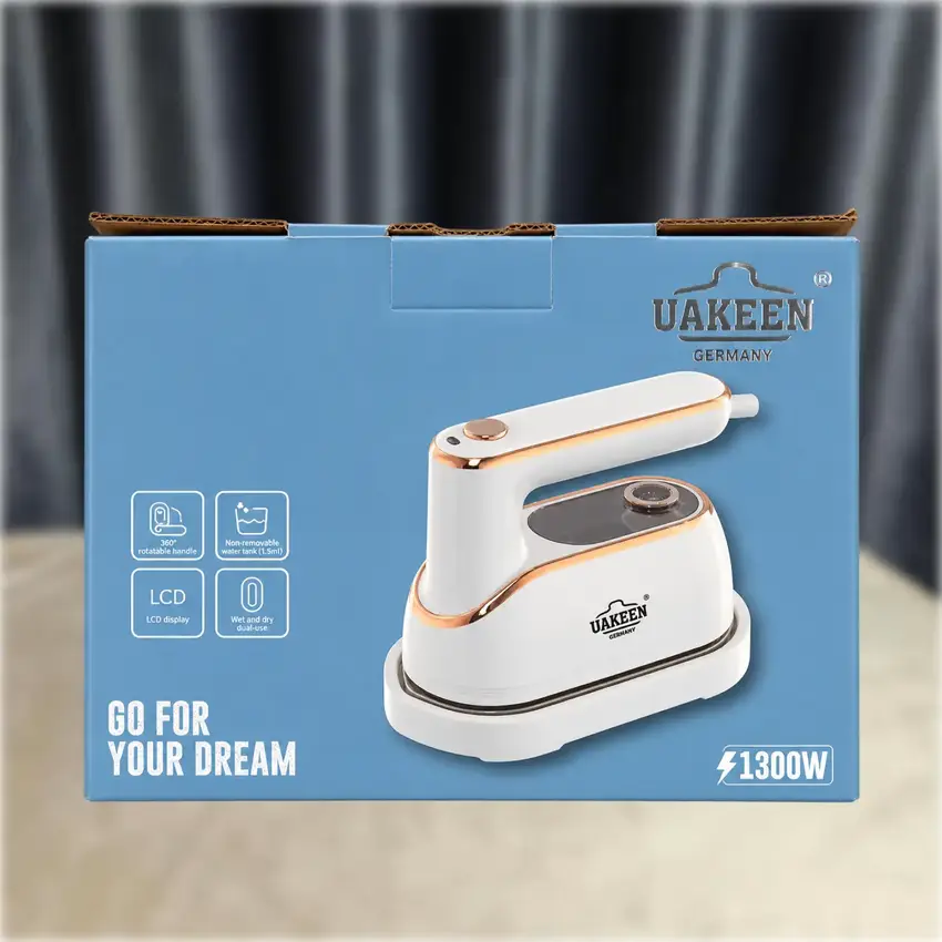 Uakeen ZL-227 folding travel iron retail box on dark background