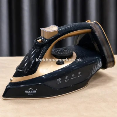 Uakeen ZL-830 steam iron angled view with UAKEEN branding